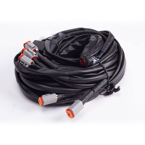 Baja Designs LP4 Wiring Harness, whole product on a studio background: A coiled multi light wiring harness with gray Deutsch connectors and a switch on white