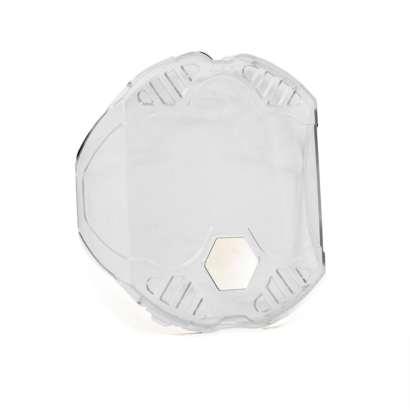 Baja Designs LP6 Single Rock Guard, whole product on a studio background: A clear LP6 rock guard with a hex center opening on a white background