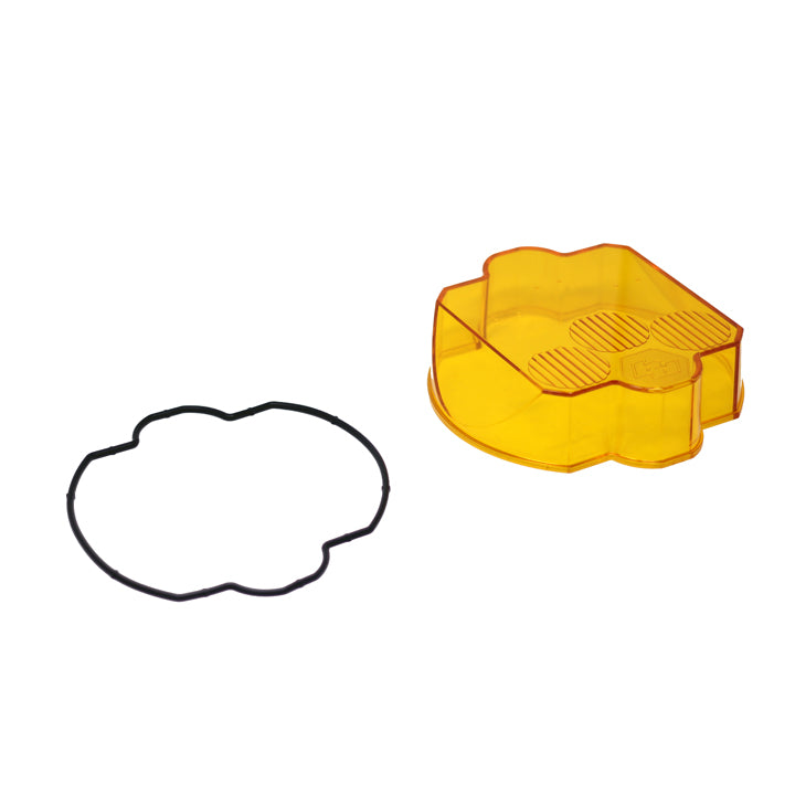 Baja Designs LP9 Light Pod Lens Kit, complete kit on a studio background: A amber LP9 replacement lens cover with fluted optics and a black rubber gasket on a white background; this SKU's frames show more than one lens color, so the color match is