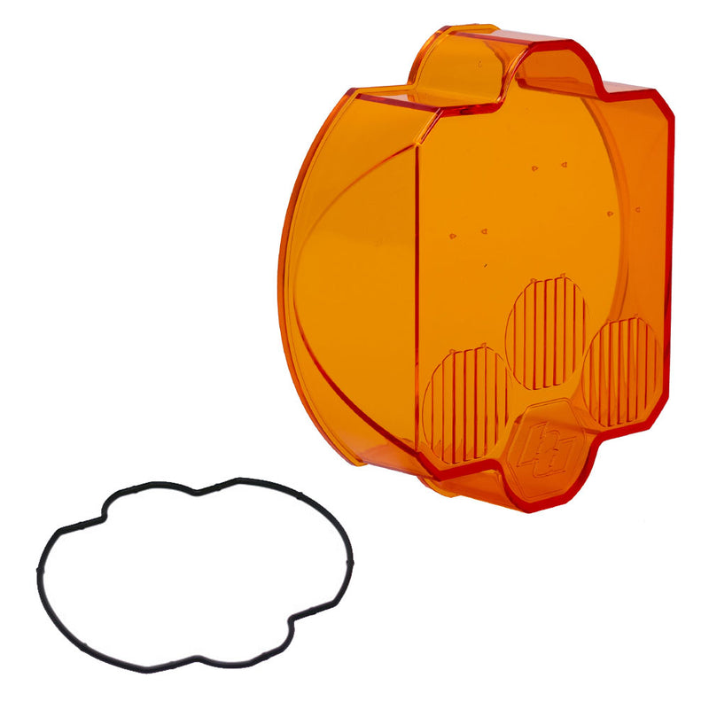Baja Designs LP9 Light Pod Lens Kit, complete kit on a studio background: A orange LP9 replacement lens cover with fluted optics and a black rubber gasket on a white background