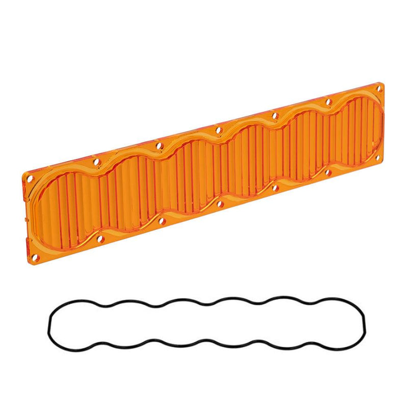 Baja Designs OnX6 Light Bar Lens Kit, complete kit on a studio background: an orange amber OnX6 light bar lens with fluted optics across its length and a black wavy gasket, angled on a white background