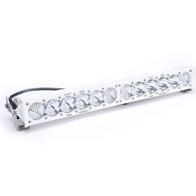 Baja Designs OnX6+ White Straight LED Light Bar, whole product on a studio background: white Baja Designs LED light bar with clear lenses, a wiring harness and end brackets on a white background
