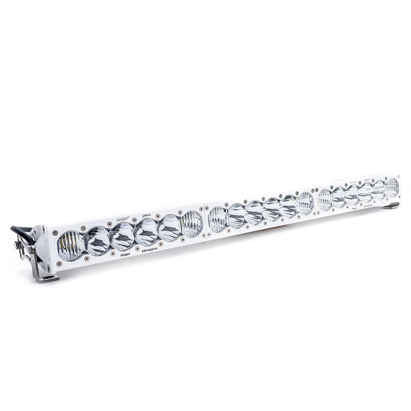 Baja Designs OnX6+ White Straight LED Light Bar, whole product on a studio background: white Baja Designs LED light bar with clear lenses, a wiring harness and end brackets on a white background