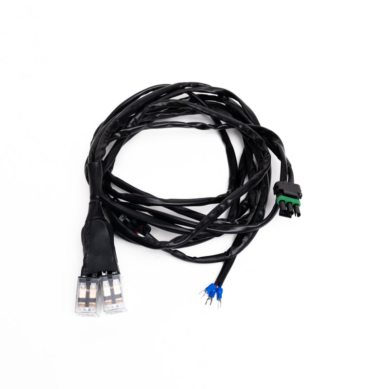 Baja Designs REFLEX Light Actuator Harness, Power Management Universal Motor Actuator Adaptor Harness, whole product on a studio background: A black actuator adaptor harness with clear motor plugs, weatherpack connectors and blue spade leads on white