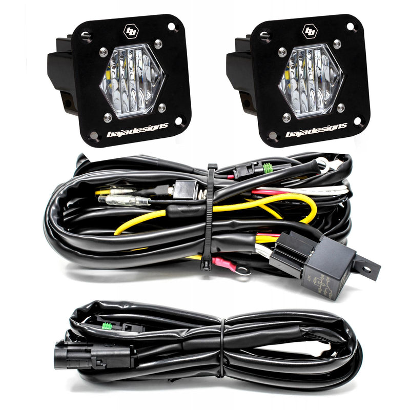 Baja Designs S1 Black Flush Mount LED Light Pod Reverse Kit, complete kit on a studio background: two black S1 flush mount pods, clear wide cornering lenses, with relay harness and extension harness on a white background