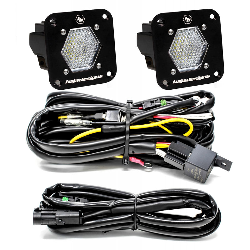 Baja Designs S1 Black Flush Mount LED Light Pod Reverse Kit, complete kit on a studio background: two black S1 flush mount pods, clear work/scene lenses, with relay harness and extension harness on a white background