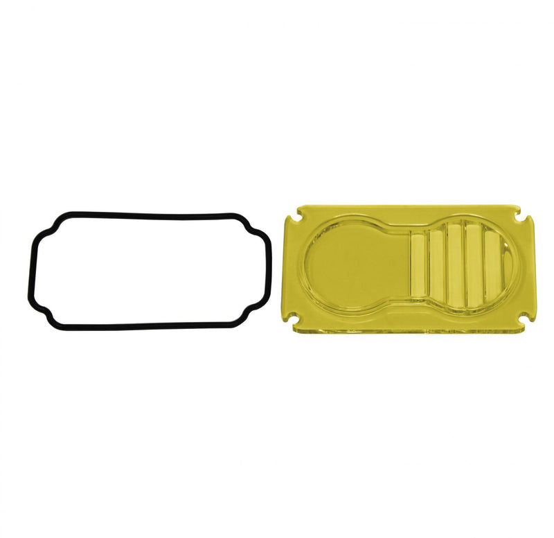 Baja Designs S2 Light Pod Lens Kit, complete kit on a studio background: A yellow-amber rectangular S2 replacement lens with a half-fluted driving/combo optic lies beside its black O-ring gasket on a white background