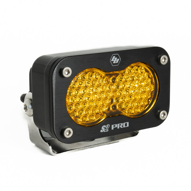 Baja Designs S2 Pro Black LED Auxiliary Light Pod, whole product on a studio background: A black S2 Pro LED pod with an amber dimpled work scene lens on a stainless bracket