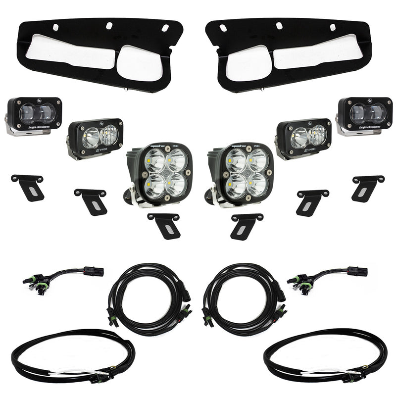 Baja Designs S2 SAE Pro Fog Pocket Light Kit, complete kit on a studio background: two black fog pocket bezels with four clear S2 pods, two clear Squadron pods, brackets and harnesses on white