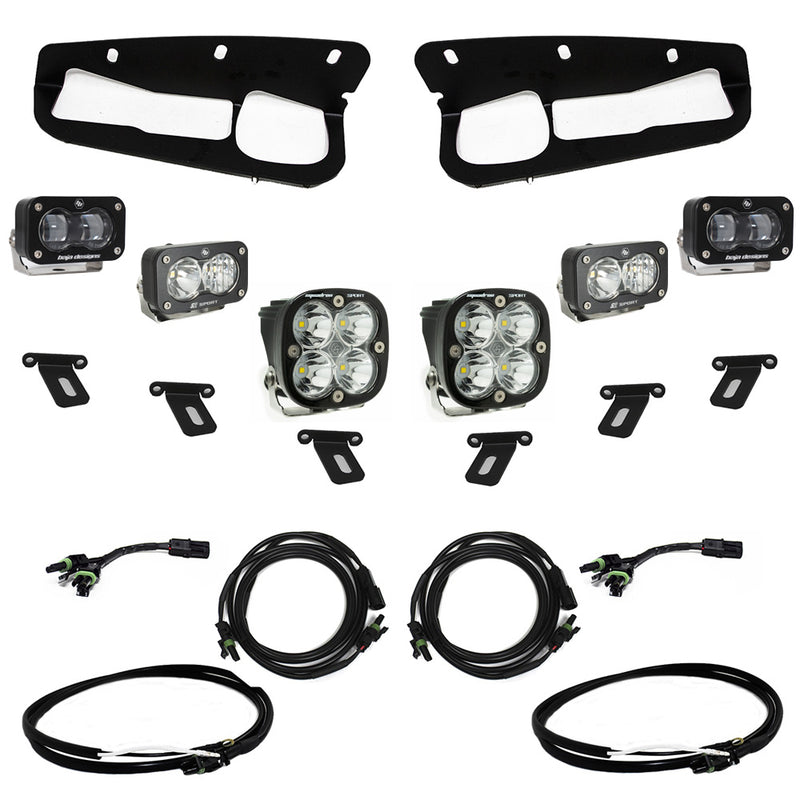 Baja Designs S2 SAE Sportsmen Fog Pocket Light Kit, complete kit on a studio background: two black fog pocket bezels with four clear S2 pods, two clear Squadron pods, brackets and harnesses on white