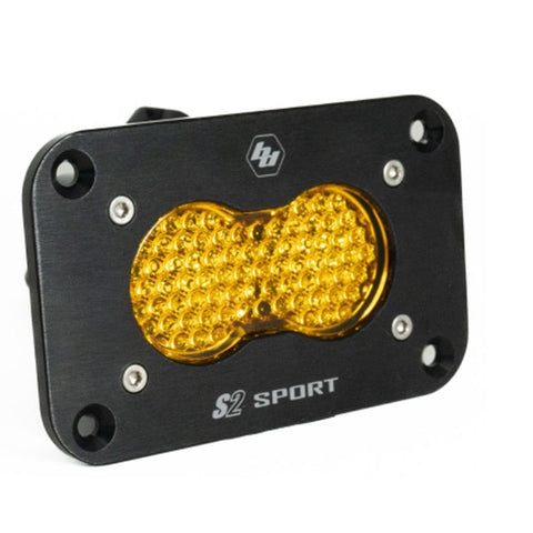 Baja Designs S2 Sport Black Flush Mount LED Auxiliary Light Pod, whole product on a studio background: black flush mount S2 Sport light pod with an amber dimpled lens on a white background