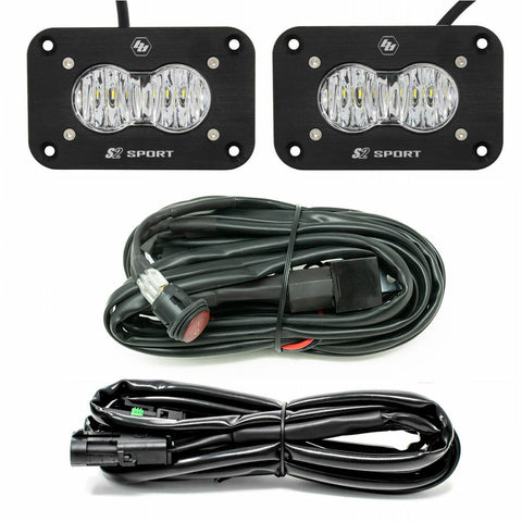 Baja Designs S2 Sport Black Flush Mount LED Light Pod Reverse Kit, complete kit on a studio background: two black flush mount S2 Sport pods with clear lenses plus two wiring harnesses on a white background