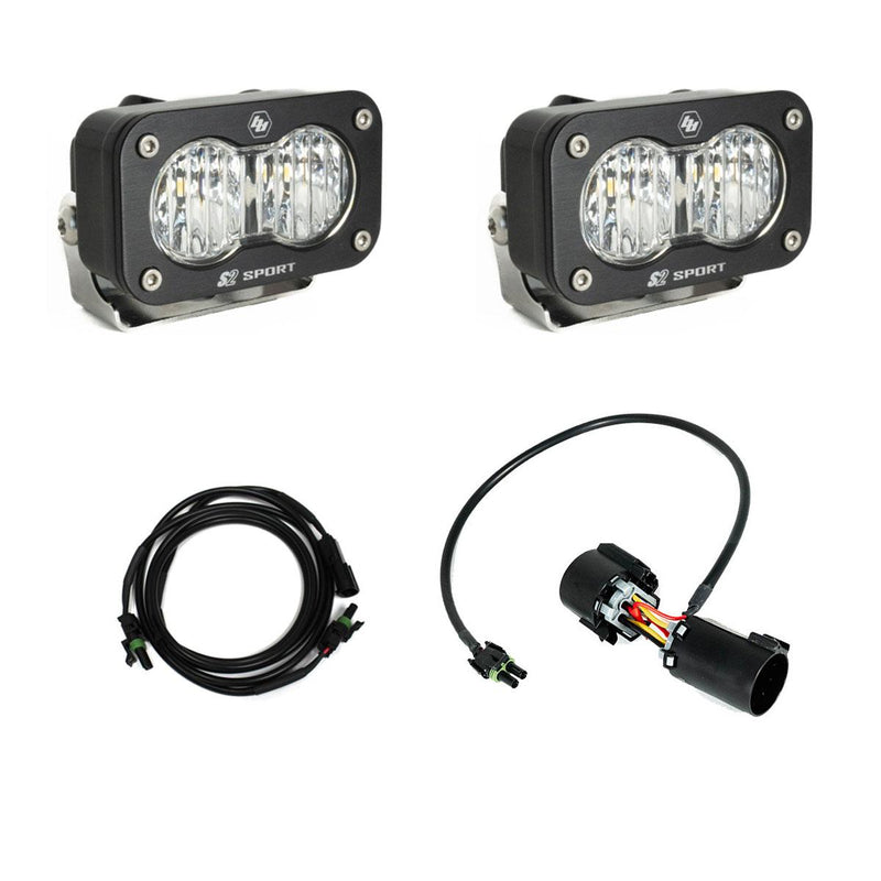 Baja Designs S2 Sport Dual Reverse Light Kit, complete kit on a studio background: two black S2 Sport LED pods with clear lenses shown with an extension harness and a plug-in adapter harness on white