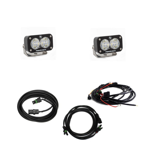 Baja Designs S2 Sport Dual Reverse Light Kit, complete kit on a studio background: two S2 Sport LED pods with clear lenses, a switched wiring harness and two extension cables on a white background