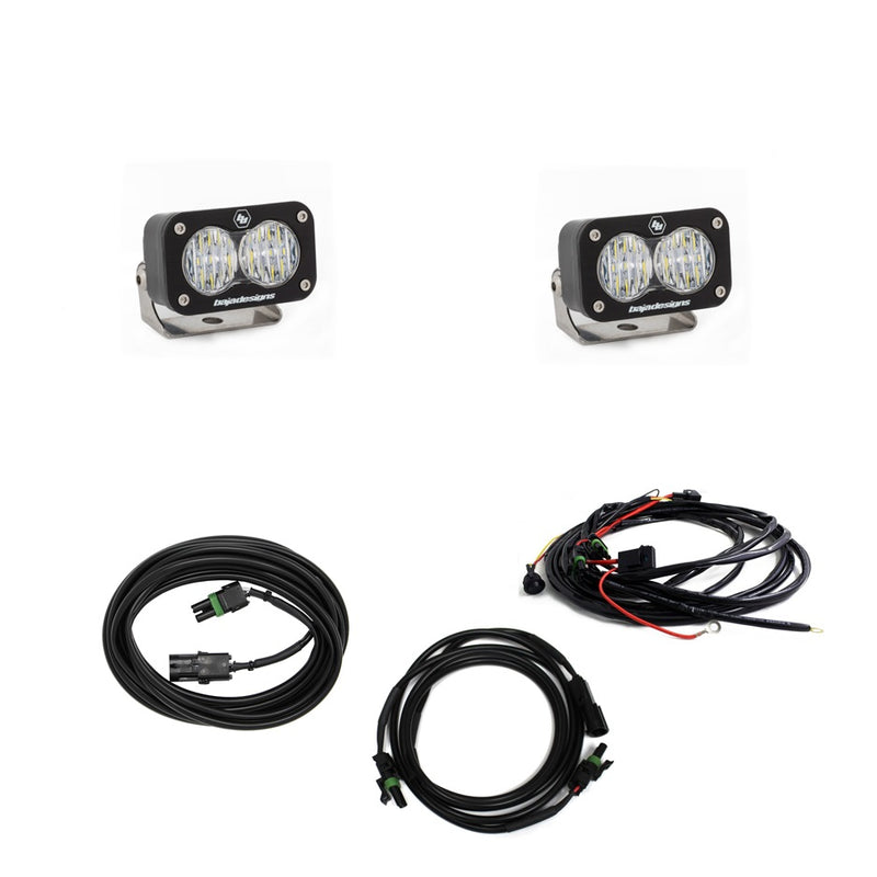 Baja Designs S2 Sport Dual Reverse Light Kit, complete kit on a studio background: two S2 Sport LED pods with clear lenses, a switched wiring harness and two extension cables on a white background