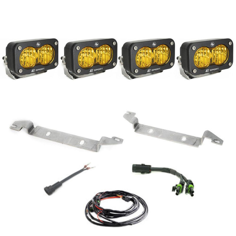 Baja Designs S2 Sport OEM Fog Light Replacement Kit, complete kit on a studio background: four black S2 Sport pods with amber lenses, two steel mounting brackets, harness adapters and a wiring harness on white