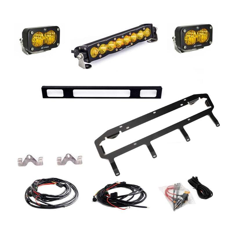 Baja Designs S8 10"/S2 Pro Grille Light Replacement Kit, complete kit on a studio background: an amber S8 10" light bar, two amber S2 Pro pods, black grille brackets, wiring harnesses and hardware laid out on white