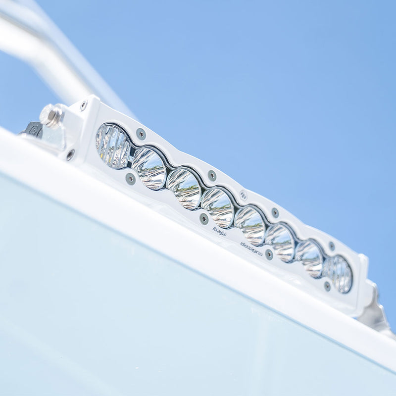Baja Designs S8 White Straight LED Light Bar on a boat: white housing S8 LED light bar mounted on the edge of a white boat top against a blue sky