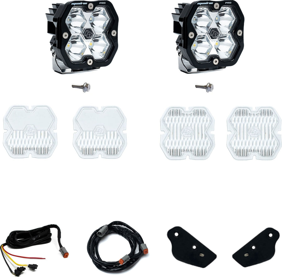 A-Pillar Light Kits by Baja Designs: A Squadron Pro A-pillar kit with two pods, bolts, spare clear lens covers, harness sections and small black brackets on white.