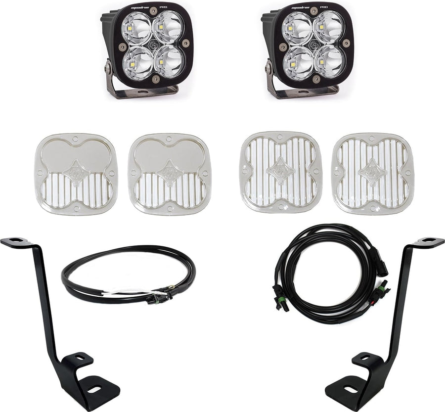 A-Pillar Light Kits by Baja Designs: Two black Squadron pods with clear lenses laid out with spare clear lens covers, black A-pillar brackets and wiring harnesses on white.