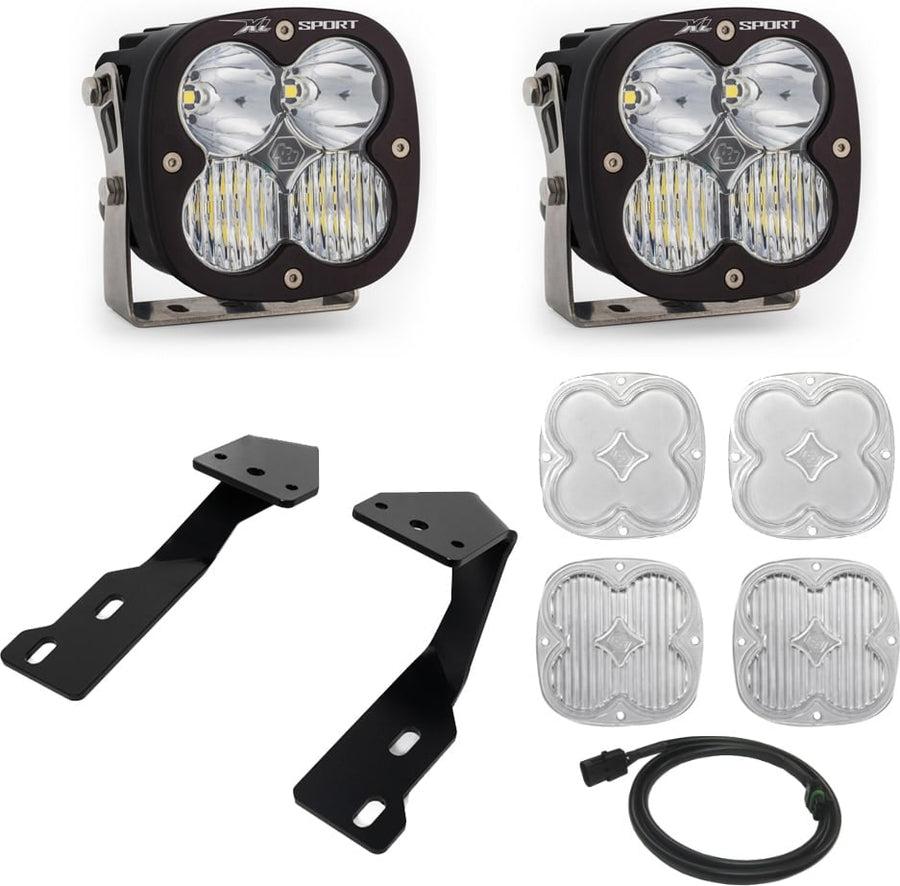 A-Pillar Light Kits by Baja Designs: Two black XL Sport pods with clear lenses shown with black A-pillar brackets, four clear lens covers and a harness on white.