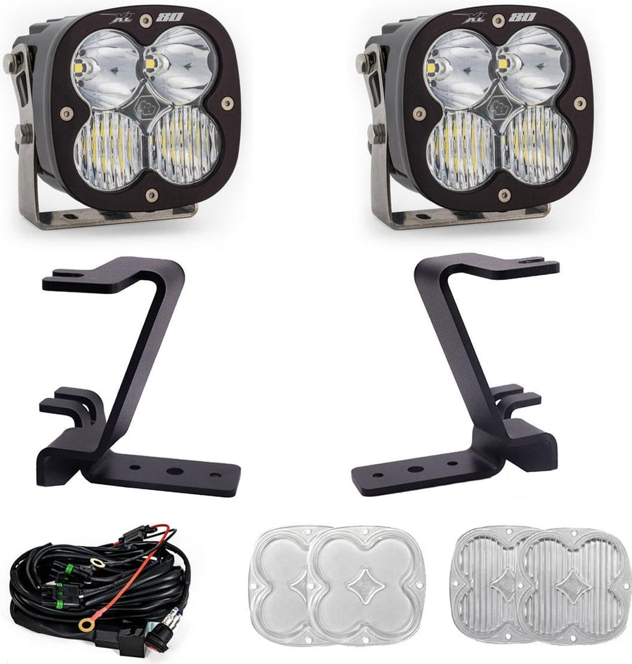 A-Pillar Light Kits by Baja Designs: A pair of Baja Designs XL80 LED pods with black A-pillar mounting brackets and wiring laid out on a white background.