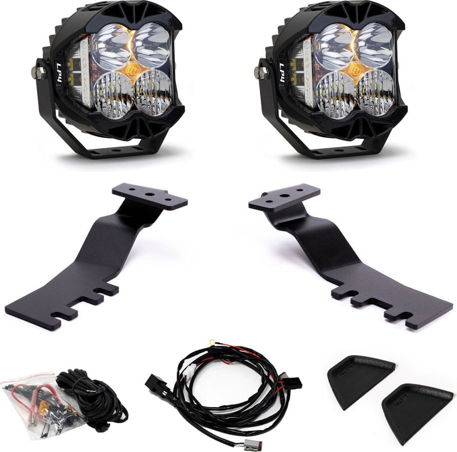 A-Pillar Light Kits by Baja Designs: A pair of LP4 LED pods with A-pillar brackets, wiring harnesses, hardware and two trim covers on white.