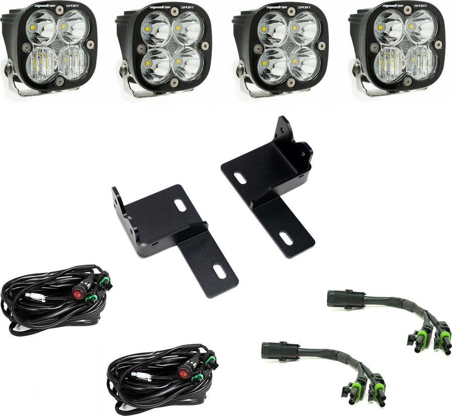 Grille Light Kits by Baja Designs: Four clear-lens Squadron Sport LED pods with two grille brackets, two switched harnesses and two splitter harnesses on white.