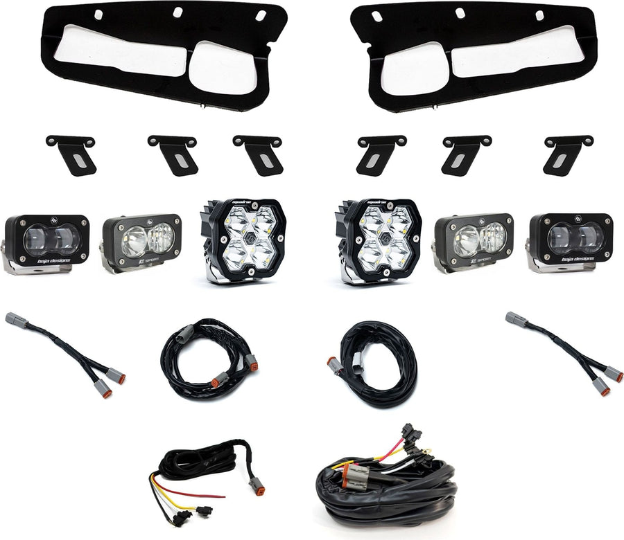 Fog Light Kits by Baja Designs: Fog pocket light kit laid out on white: two black bezels, mounting brackets, two Squadron pods, four S2 pods and wiring harnesses.