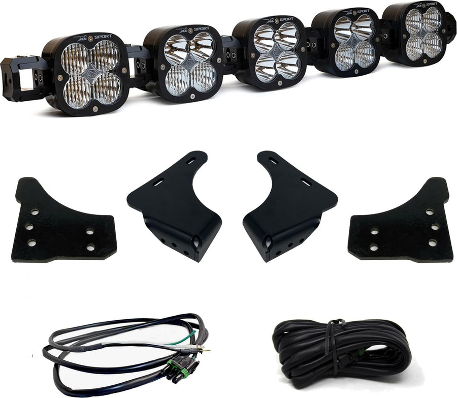 Bumper Light Kits by Baja Designs: A five-pod XL Linkable light bar kit on white with four bumper brackets, a pigtail harness and a coiled extension harness.