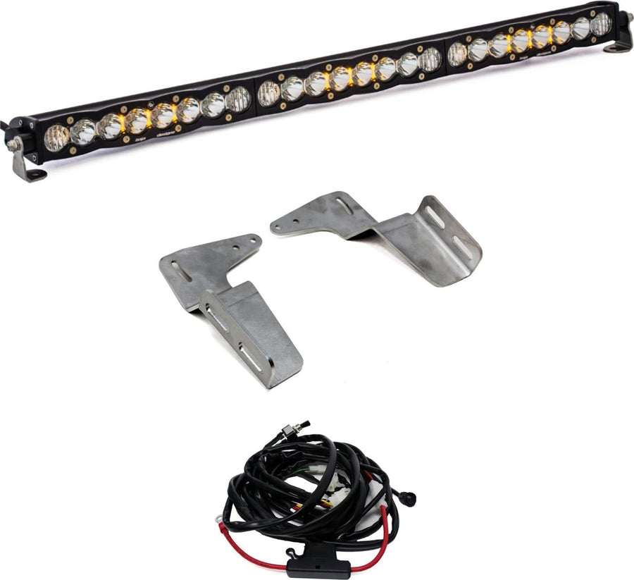 Bumper Light Kits by Baja Designs: An S8 light bar with clear lenses shown with two bare steel mounting brackets and a wiring harness on white.