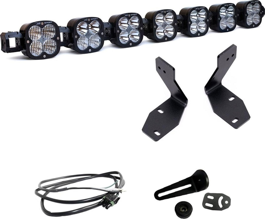 Bumper Light Kits by Baja Designs: Seven linked XL pods shown with two black brackets, a wiring harness and small mounting hardware on white.