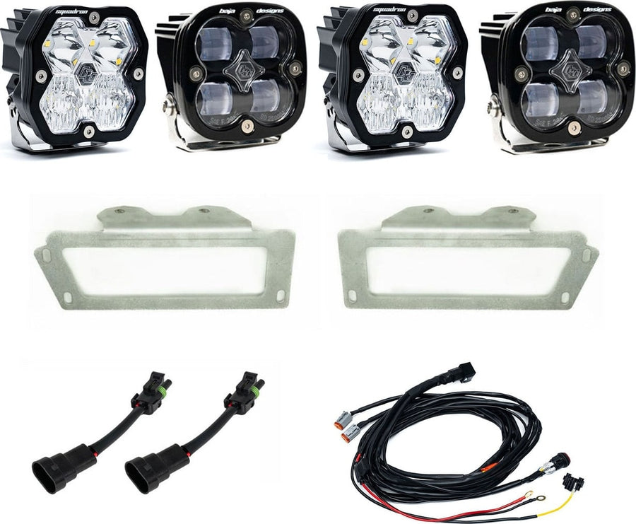 Fog Light Kits by Baja Designs: Dual fog pocket light kit with four square Squadron pods, two stainless bezel frames, adapters and wiring harness on white.