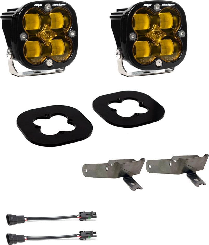 Fog Light Kits by Baja Designs: Pair of square Squadron pods with black rubber gaskets, steel brackets and two pigtail harnesses, amber lenses laid out on a white background.