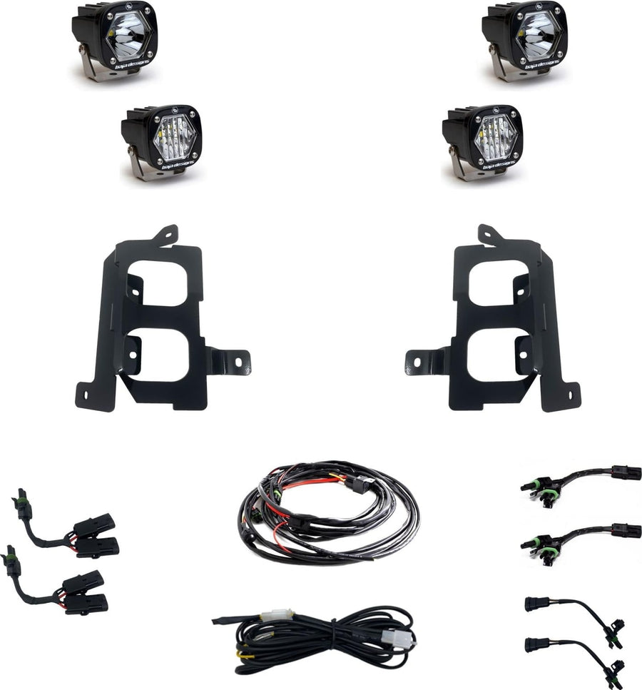 Fog Light Kits by Baja Designs: Four S1 pods, two black fog pocket brackets, wiring harness and pigtail adapters, all clear lenses laid out on a white background.