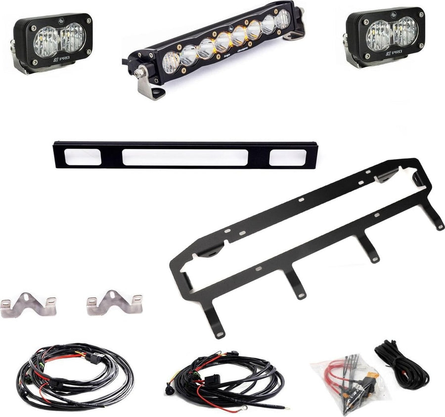 Grille Light Kits by Baja Designs: A clear S8 10-inch light bar, two clear S2 Pro pods, black grille brackets, wiring harnesses and hardware laid out on white.