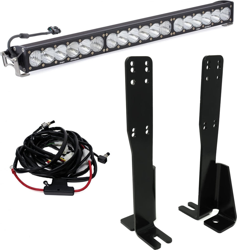 Grille Light Kits by Baja Designs: An OnX6+ 30-inch light bar with two tall black mounting brackets and a wiring harness on white.