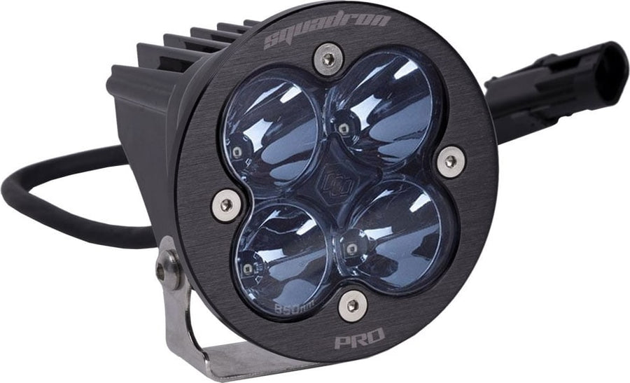 Laser & Infrared Lights by Baja Designs: A round black Squadron-R Pro LED pod with four smoked optics on a stainless bracket with pigtail on white.