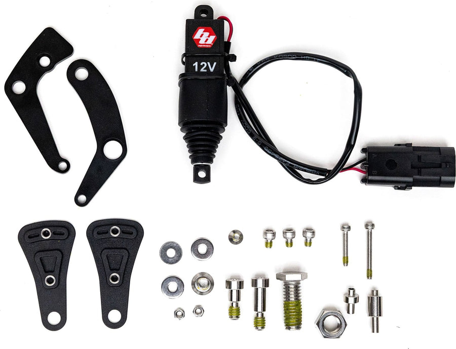 Mounts & Hardware by Baja Designs: The REFLEX actuator kit for XL housings laid out on white: 12V actuator with harness, black brackets, plates and assorted hardware.