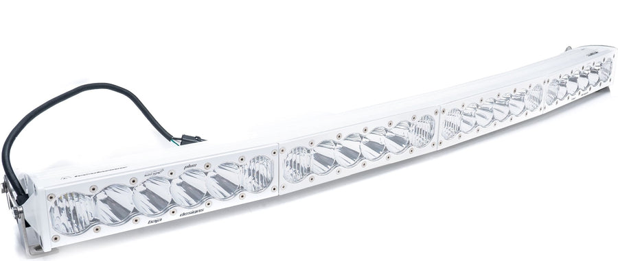 LED Light Bars by Baja Designs: Curved white LED light bar with clear lenses and a wiring harness on a white background.