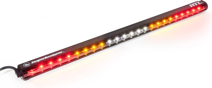 Rear & Utility Lights by Baja Designs: Long RTL LED rear light bar lit red and amber at the ends with a white center section on a white background.