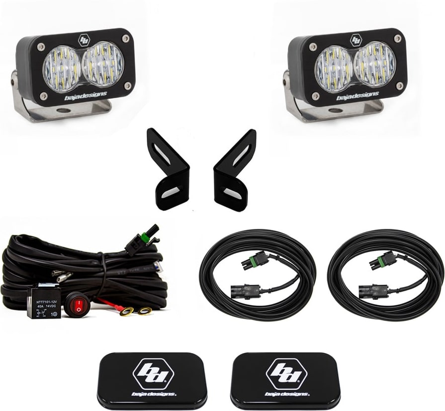 Reverse Light Kits by Baja Designs: Pair of S2 Sport LED pods with angled brackets, a relay harness, two extension cables and two logo covers on white.