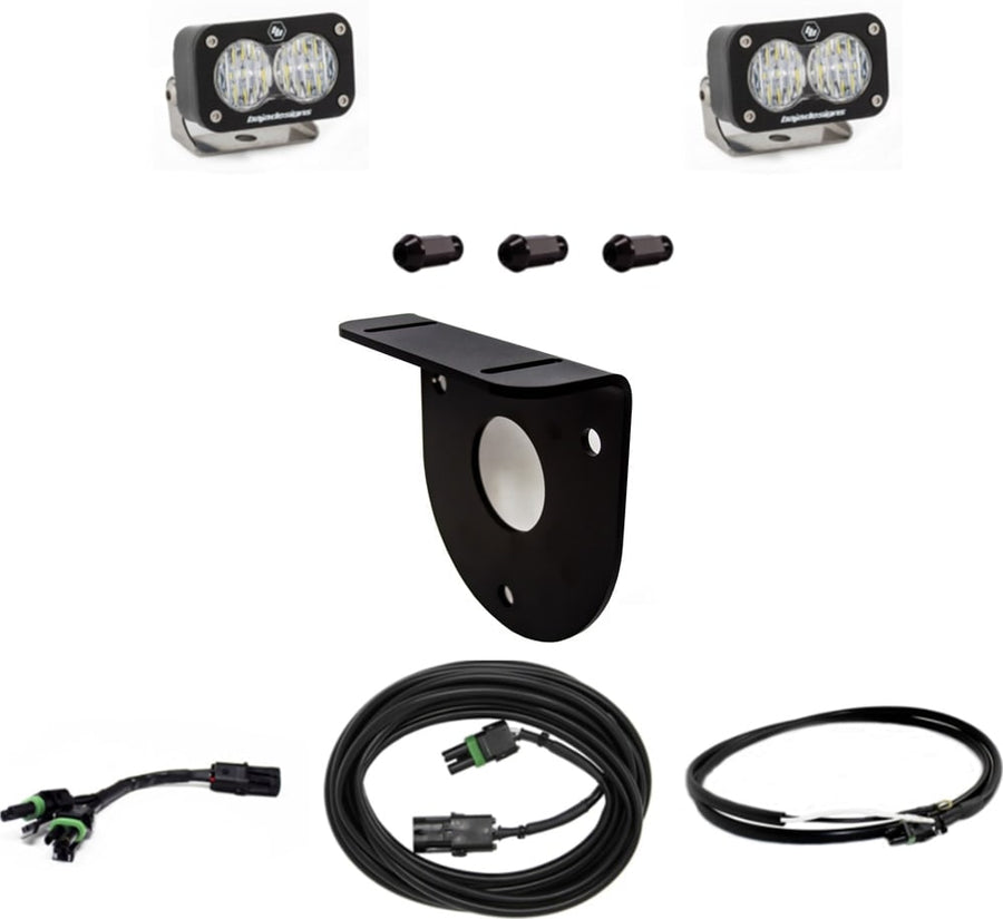 Reverse Light Kits by Baja Designs: Pair of S2 Sport pods with a spare-tire bracket, spacers, an adapter and two cables on white.