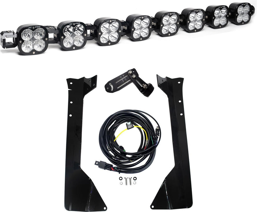 Roof Light Kits by Baja Designs: An eight-pod linkable LED roof bar with tall black windshield brackets, a center mount, harness and hardware on white.