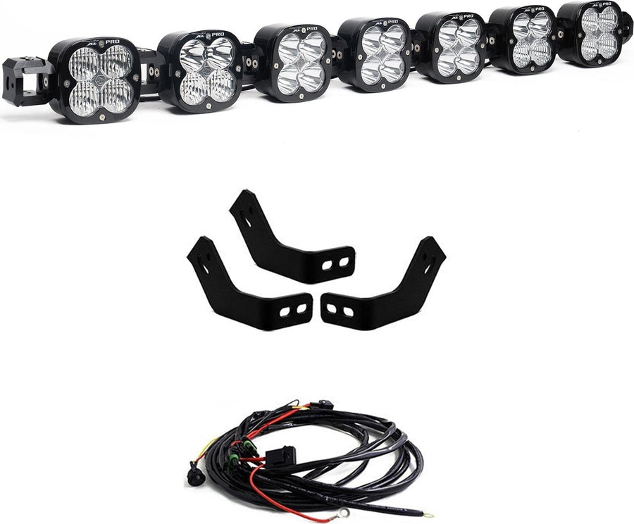 Roof Light Kits by Baja Designs: A linkable LED pod roof bar with black rack brackets and a wiring harness on a white background.