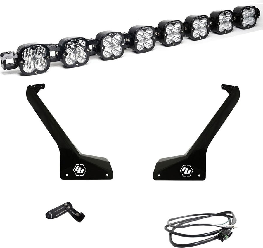 Roof Light Kits by Baja Designs: An eight-pod linkable LED roof bar with two black Jeep A-pillar brackets, a center mount and a wiring harness on white.