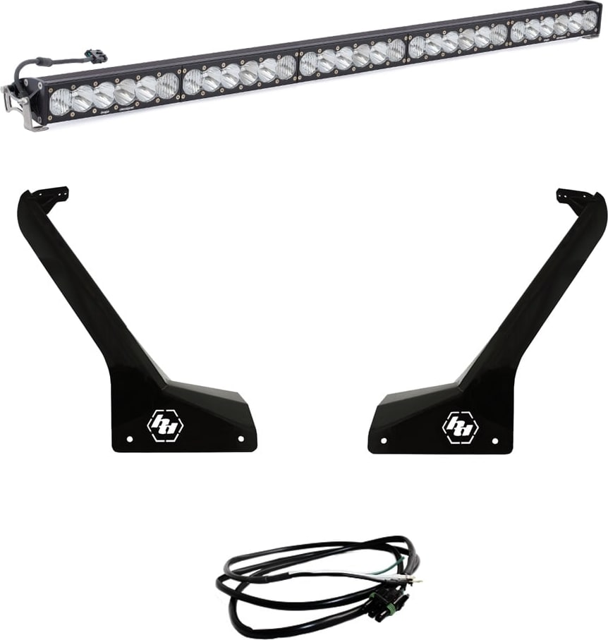 Roof Light Kits by Baja Designs: A long LED light bar shown above two black Jeep A-pillar roof brackets and a coiled wiring harness on white.
