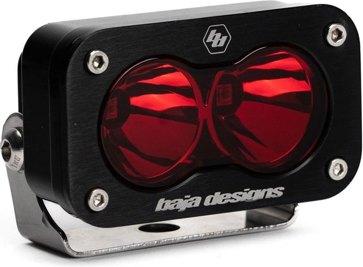 S2 Light Pods by Baja Designs: A single black S2 LED pod glowing red through its spot lens, on a stainless bracket.
