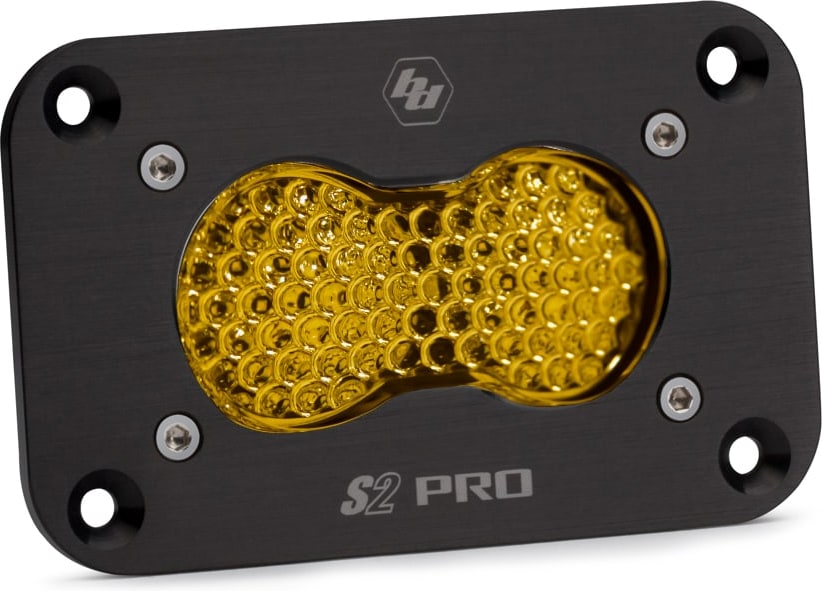 Mounts & Hardware by Baja Designs: A black S2 Pro flush mount LED pod with an amber honeycomb lens on a white background.