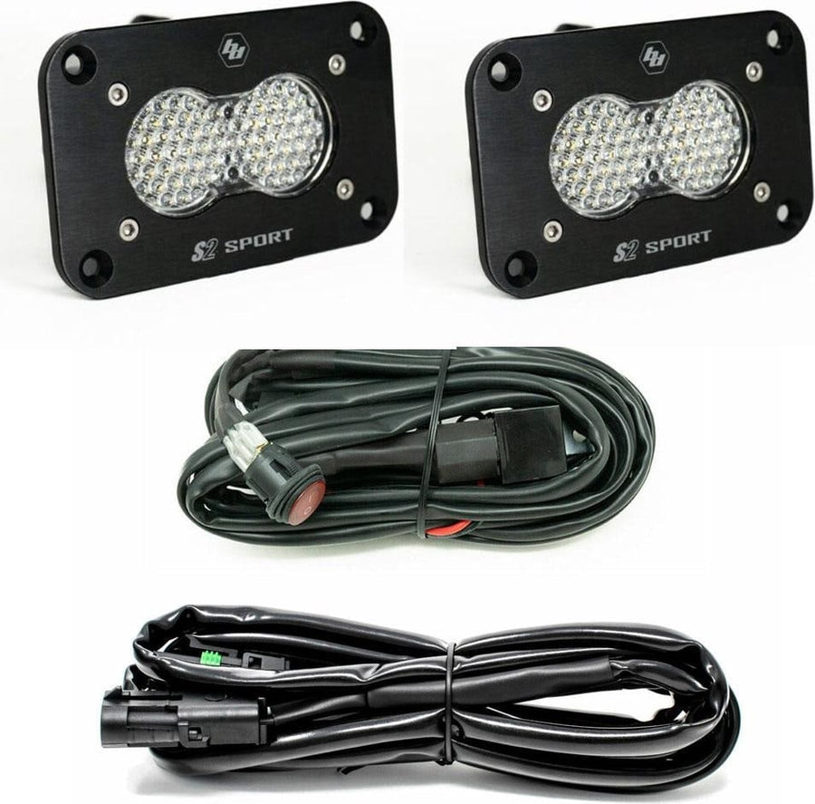 Mounts & Hardware by Baja Designs: Two black flush mount S2 Sport pods with clear dimpled lenses plus a switch harness and an extension harness on a white background.